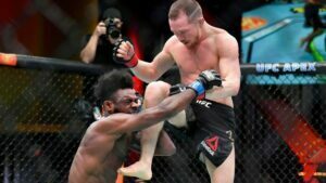 PETR YAN ILEGAL KNEE TO ALJAMAIN STERLING